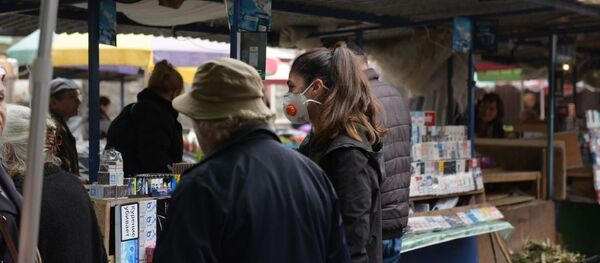 Люди в масках на рынке  - Sputnik Аҧсны
