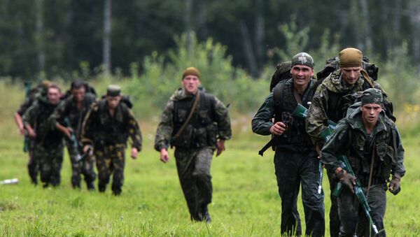Военнослужащие вооруженных сил России во время финиша первого этапа Десантирование, совершение марш-броска  - Sputnik Абхазия