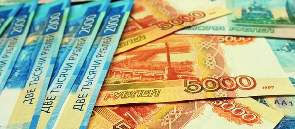 Банкноты номиналом 1000, 2000 и 5000 рублей. - Sputnik Аҧсны