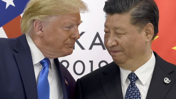 Президент США Дональд Трамп и председатель КНР Си Цзиньпин в ходе встречи на саммите G20 в Осаке. 29 июня 2019 - Sputnik Абхазия
