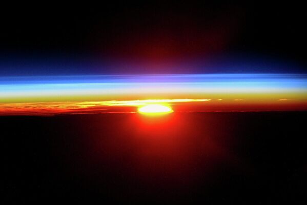 Закат солнца с борта Международной космической станции - Sputnik Абхазия