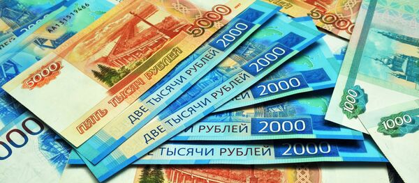 Банкноты номиналом 1000, 2000 и 5000 рублей. Банкноты номиналом 1000, 2000 и 5000 рублей. - Sputnik Абхазия